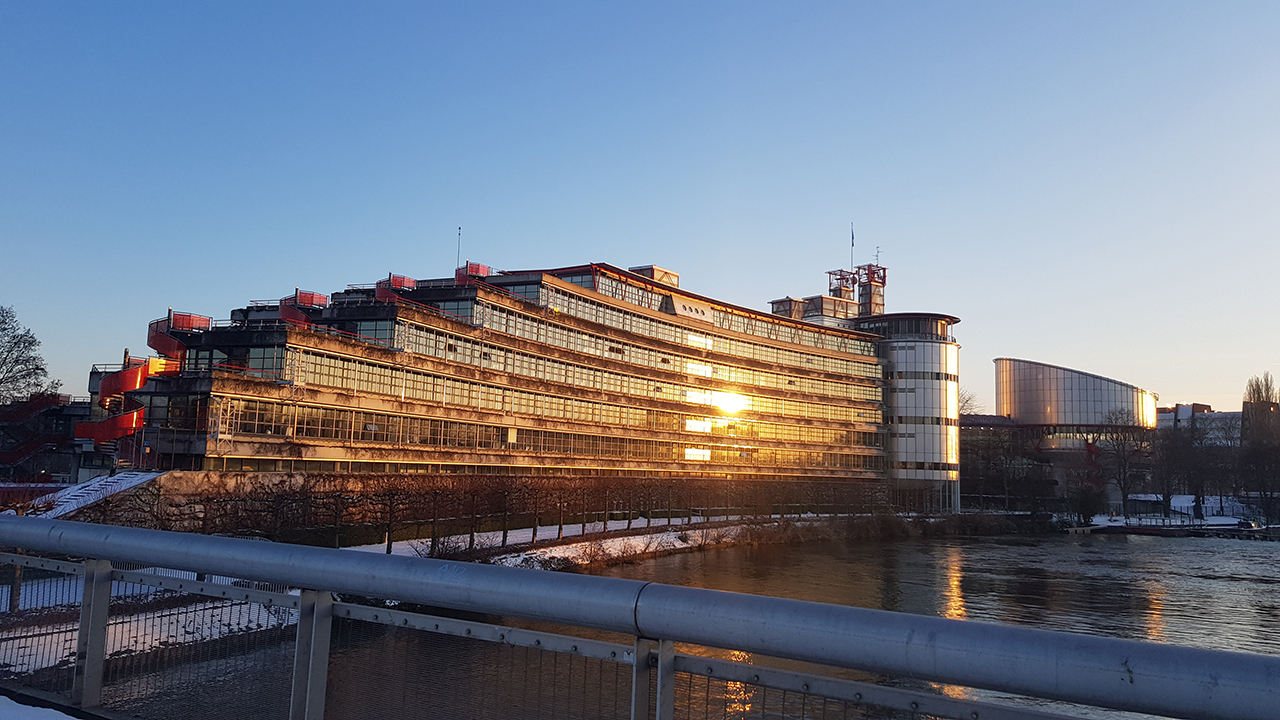 Human Rights building in winter - sunset on the rear side of the building